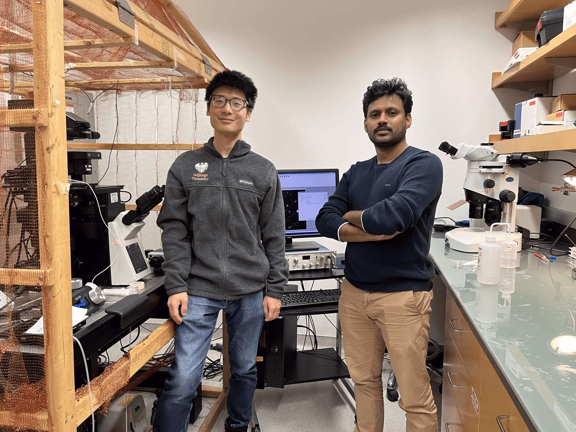 students pose in the lab