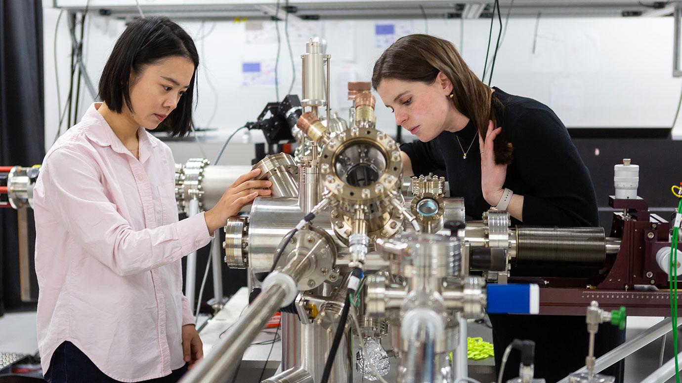 Sarah King and student in the lab