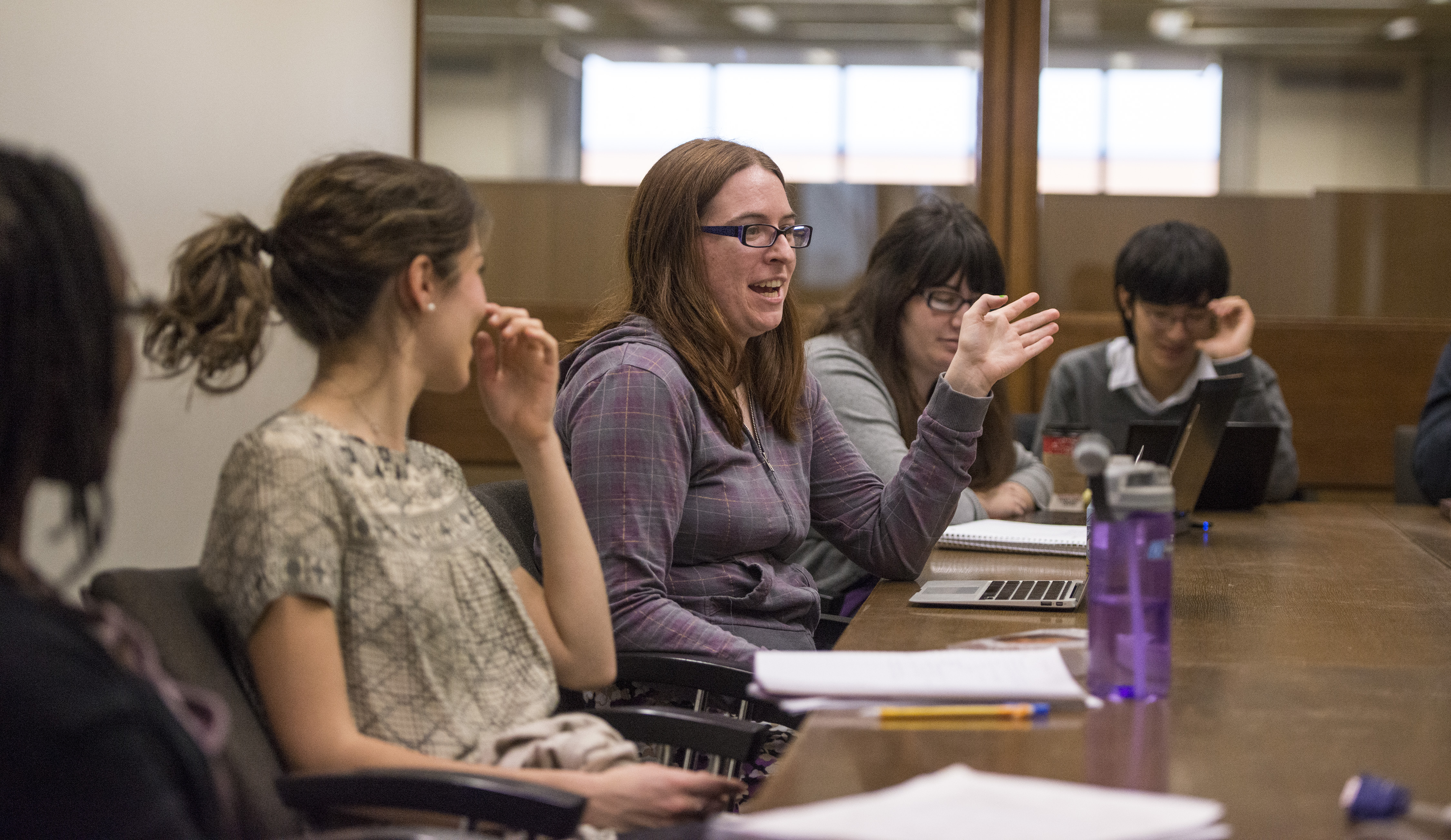 People discussing during a class