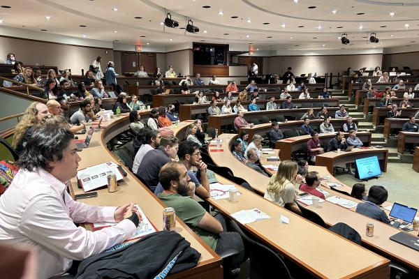 People in the audience watching a talk